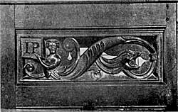 Carving in Attenborough Church shewing intials of John Poutrell.