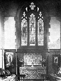 The 1939-1945 War Memorial East Window and Reredos.