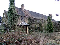 Hempshill Hall, overgrown and empty, in 2003.