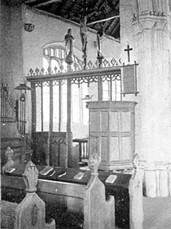 The rood screen and pulpit.