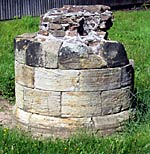 A column base is all that remains above ground of Lenton Priory church.