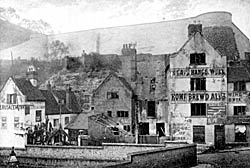 Brew House Yard c.1900. The Gate Hangs Well pub is on the right; the Old Trip to Jerusalem is on the extreme left.