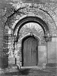 Plumtree church: Norman west door, c.1910.