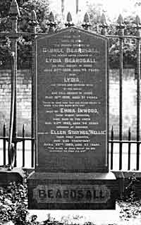 THE GRAVESTONE of GEORGE and LYDIA BEARDSALL, with the Forest Road railings of the cemetery behind.