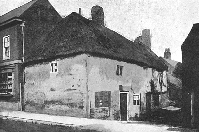 OLD THATCHED HOUSE. Now replaced by Sand Rock House; a similar House was on site of the present Tower House; and two Barns are replaced by Crown House—now forming St. Michael's Place. Two old Thatched Barns occupied site of Darrel House and The Gables, near the Church. Such was West Retford Street in 1848. 